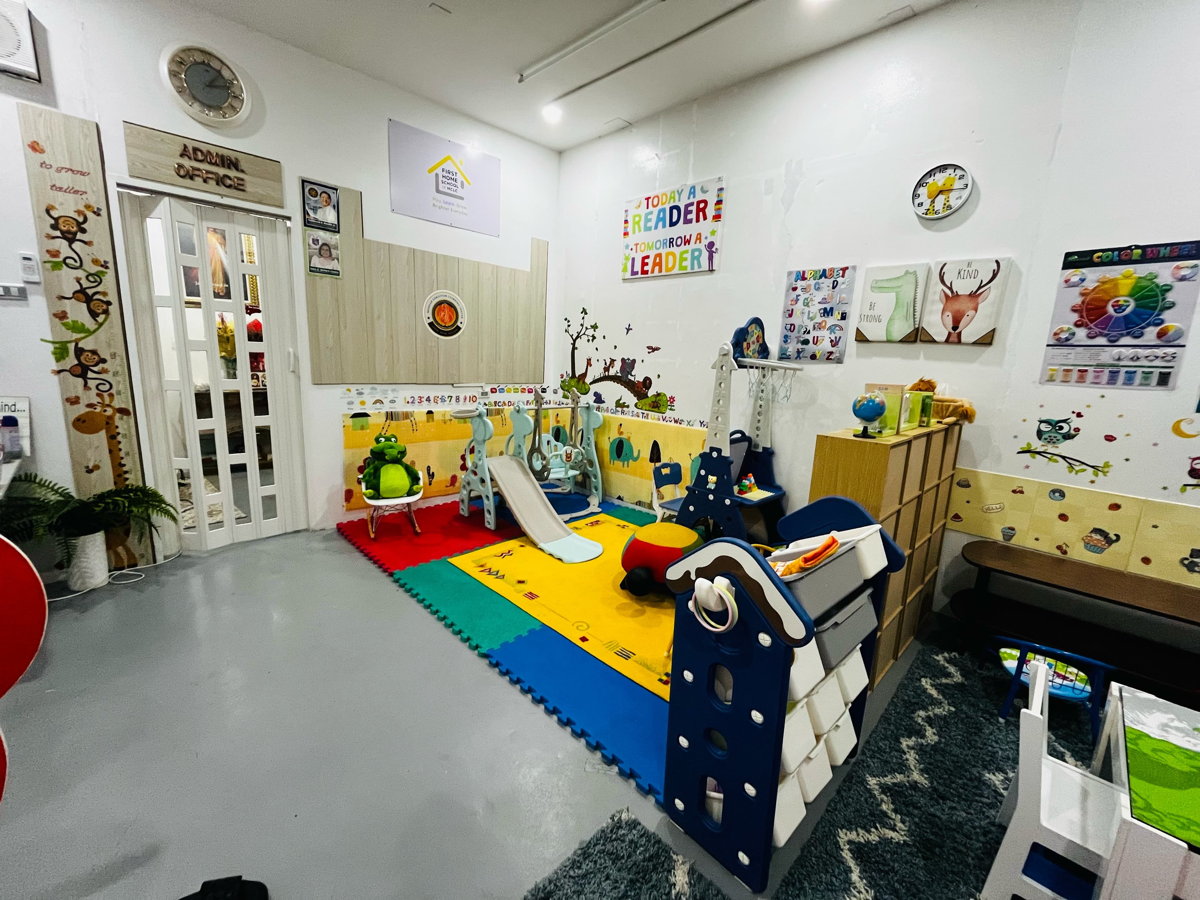 Indoor play area with slide inside the MCLC classroom